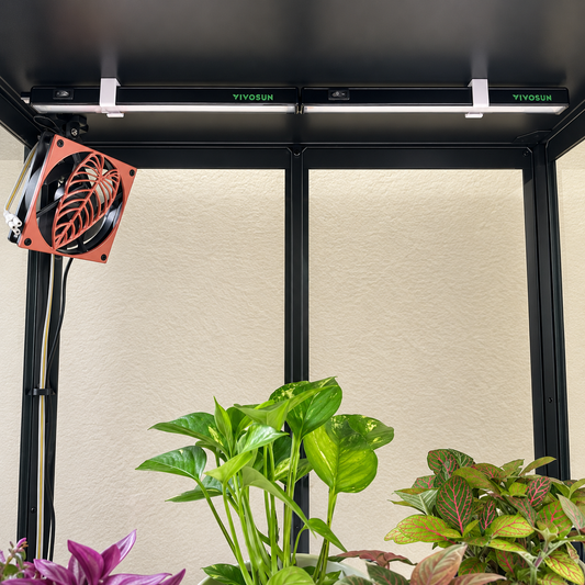 Two Vivosun T5 light bars mounted under a plant cabinet shelf.