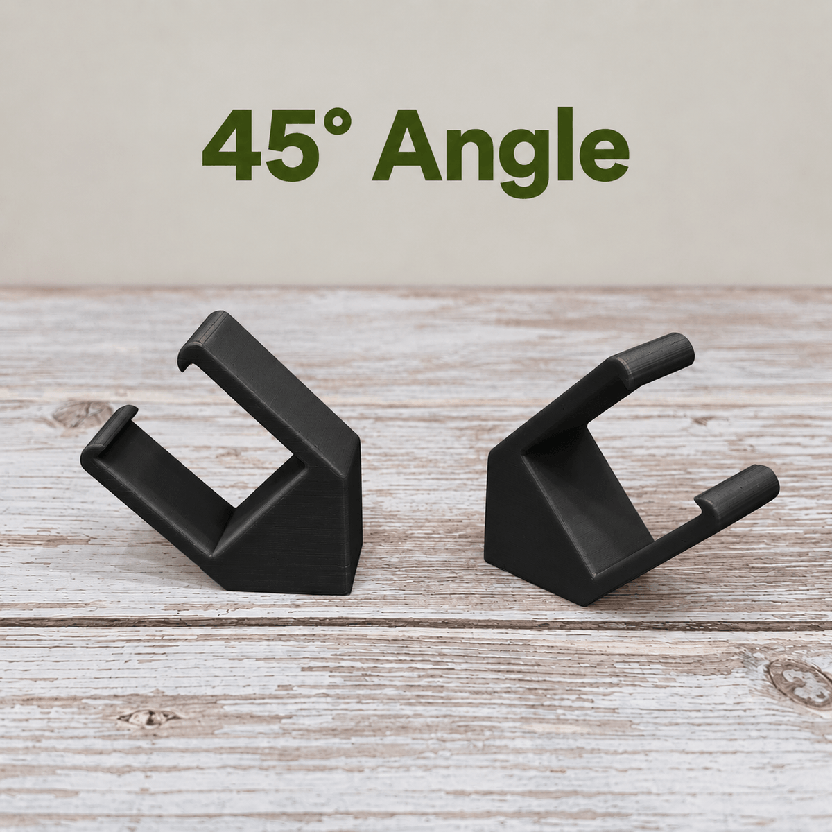 Two black PETG magnetic mounts for Barrina T5 grow lights on a pale wood surface, labeled 45° Angle.