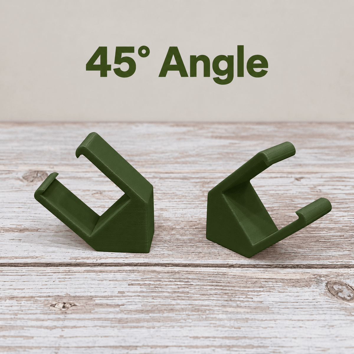 Two olive green PETG magnetic mounts for Barrina T5 grow lights on a pale wood surface, labeled 45° Angle.