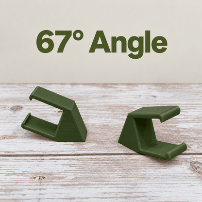 Two olive green PETG magnetic mounts for Barrina T5 grow lights on a pale wood surface, labeled 67° Angle.