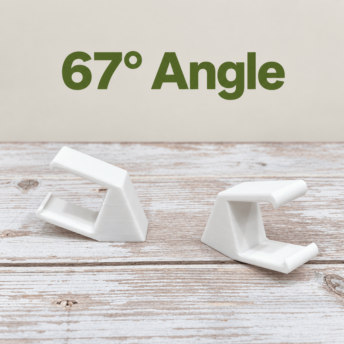 Two white PETG magnetic mounts for Barrina T5 grow lights on a pale wood surface, labeled 67° Angle.