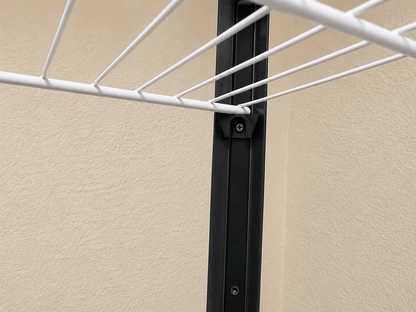 Rear corner bracket installed with a white wire shelf in an IKEA Milsbo Tall cabinet.