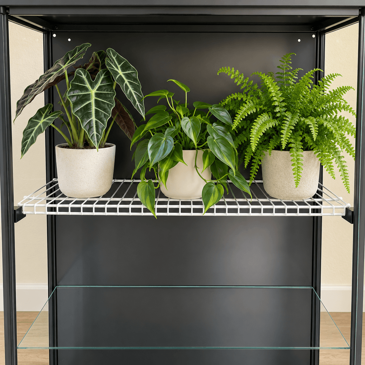 Detailed view of a black shelf bracket mounted to the IKEA Rudsta cabinet frame, showing the white wire shelf resting in the support.