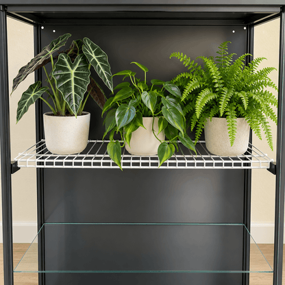 Detailed view of a black shelf bracket mounted to the IKEA Rudsta cabinet frame, showing the white wire shelf resting in the support.
