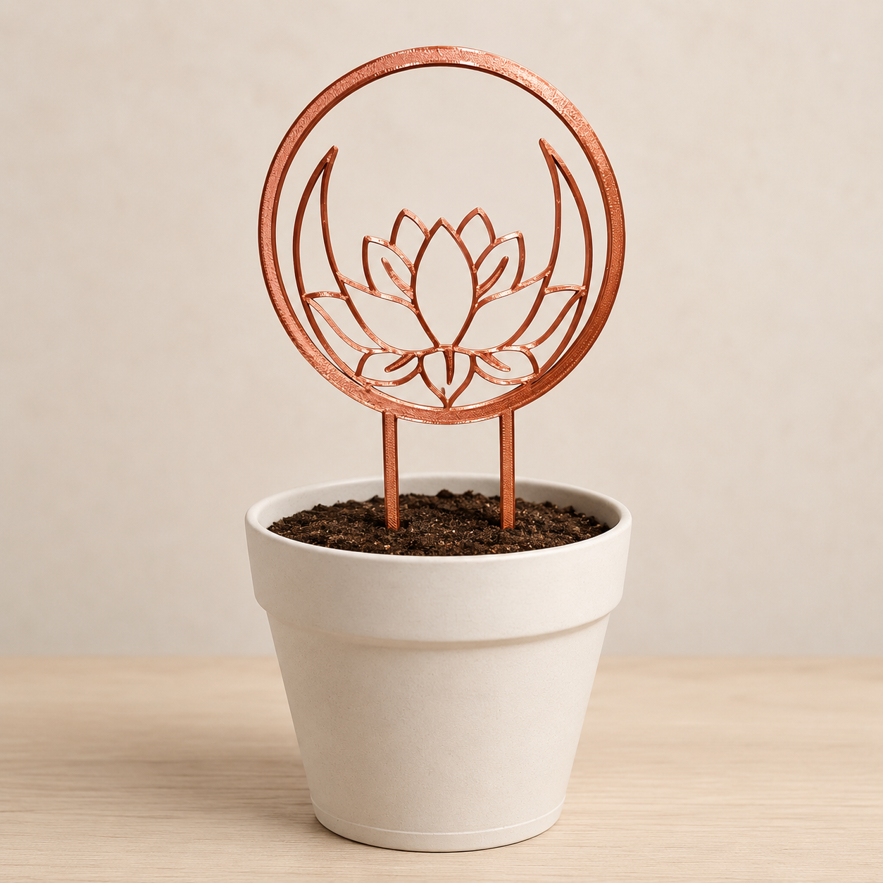 Decorative lotus flower plant trellis displayed in an indoor flowerpot