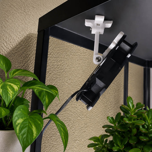 Magnetic fan mount installed inside IKEA plant cabinet – side view