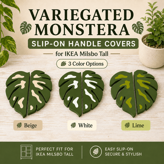 Three leaf-shaped slip-on handle covers in variegated monstera patterns are shown on a light wood surface, labeled Beige, White, and Lime. Text above reads 'VARIEGATED MONSTERA SLIP-ON HANDLE COVERS for IKEA Milsbo Tall' and the bottom banner says 'PERFECT FIT FOR IKEA MILSBO TALL' and 'EASY SLIP-ON SECURE & STYLISH'.