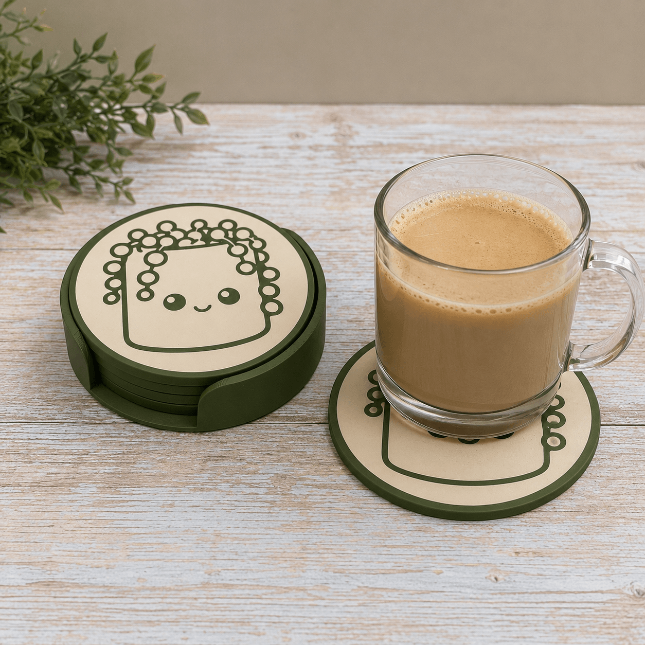 Whimlings Houseplant Friends coaster used beneath a glass coffee mug